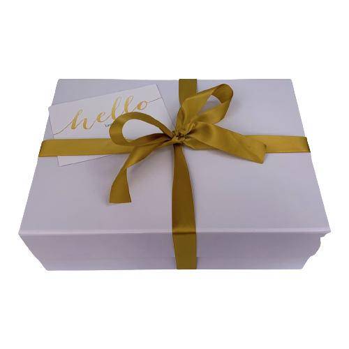 White keepsake box with gold ribbon